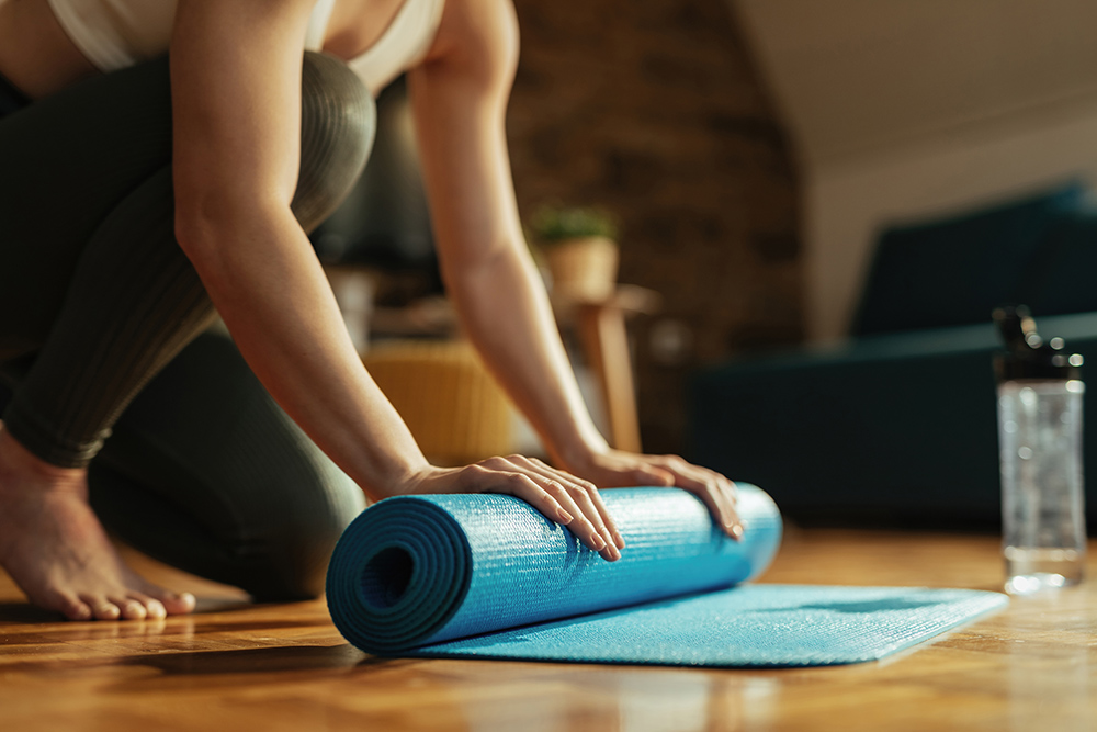 Unrolling Yoga Mat