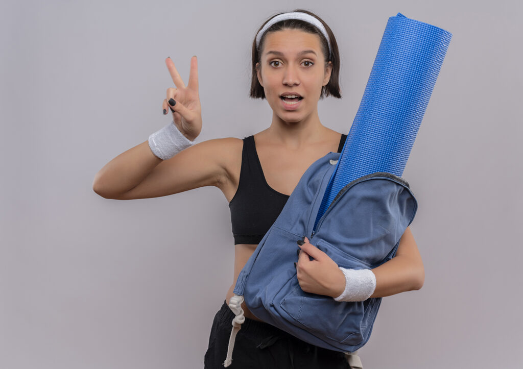 Women Holding Yoga Bag