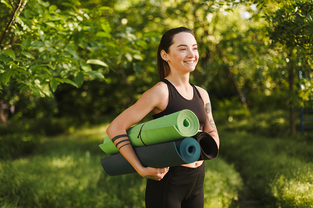 Woman Holding Eco Mat